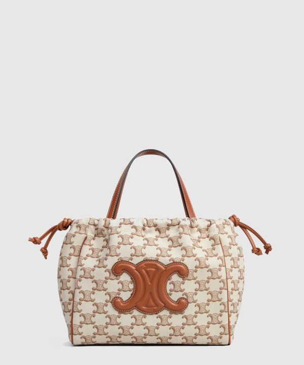 [CELINE-셀린느]스몰 로고 엠보 패브릭과 소가죽 스트링백 111012